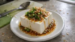 混ぜてかけるだけで満足感:ごま油香るポン酢だれの冷奴(火を使わない副菜)